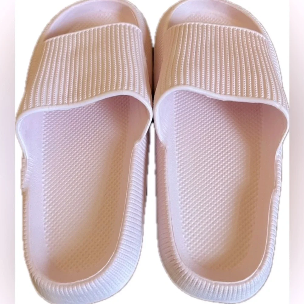 Pink slide sandals. Comfortable and cute. Excellent condition. Size 8.5